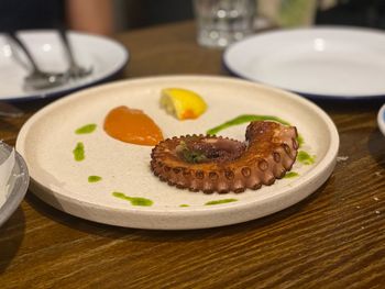 Close-up of food served on table