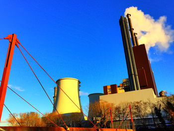 Low angle view of built structure against blue sky