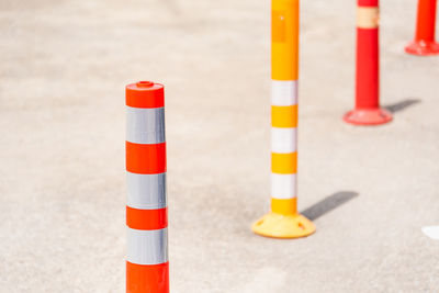 Close-up of traffic cones on road