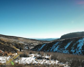 Scenic view of mountains against clear sky