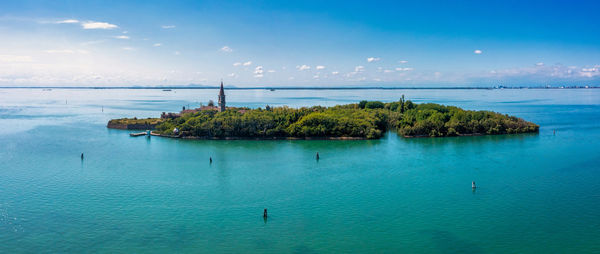 Aerial view of the plagued ghost island of poveglia in venice