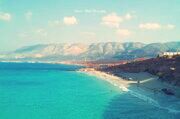 sea, water, blue, scenics, tranquil scene, beauty in nature, tranquility, sky, waterfront, nature, idyllic, mountain, cloud - sky, cloud, horizon over water, outdoors, day, island, ocean, seascape