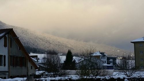 Snow covered mountain against sky