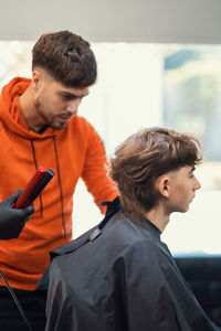 Barber haircut in a barbershop