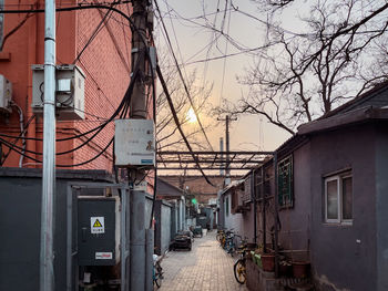 Street amidst buildings against sky