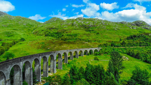 Scenic view of arch bridge against sky