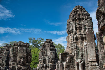 The bayon, prasat bayon is a richly decorated khmer temple at angkor in cambodia
