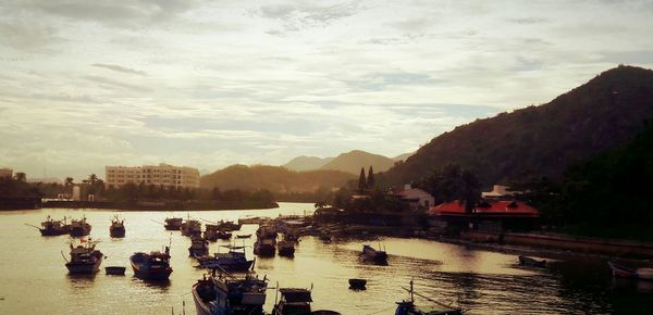 Boats moored in sea