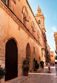 Entrance of historic building against sky