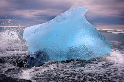 Ice on sea during sunset