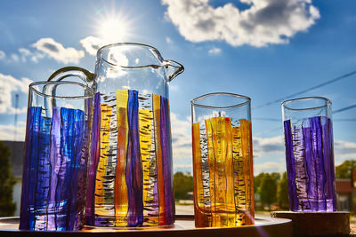 Close-up of glasses on table