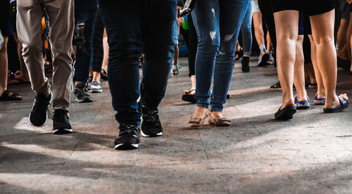 Low section of people walking outdoors