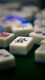 Close-up of piano keys on table