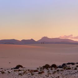 Scenic view of desert against clear sky