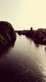 Scenic view of river against clear sky