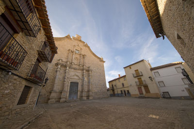 Low angle view of buildings against sky