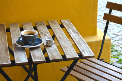 High angle view of coffee cup on table