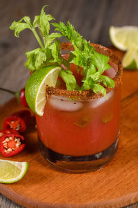 Michelada the mexican bloody mary. made with tequila, spicy sauce, served over ice in a glass 