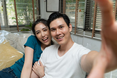 Portrait of smiling young couple