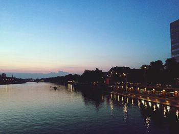 Scenic view of river at sunset