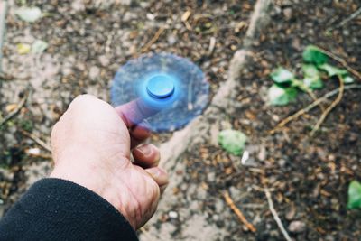 Fidget spinner rotating on finger