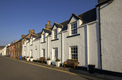 A row of houses along the waterfront in ullapool in the scottish highlands, uk