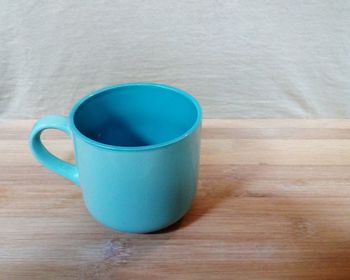 High angle view of coffee cup on table