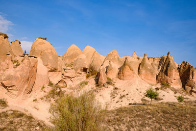 Panoramic view of rocks against sky