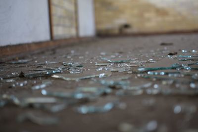 Broken glass on floor
