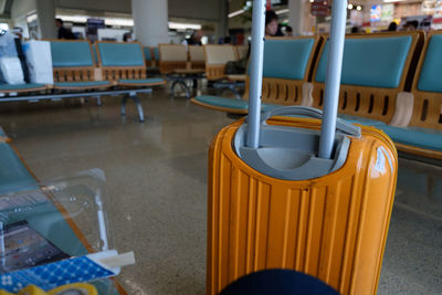 Close-up of wheeled luggage at airport