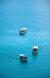 High angle view of ship sailing in sea