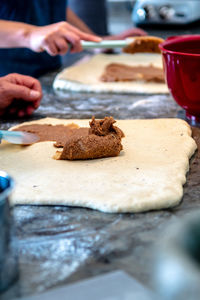 Close-up of person preparing food