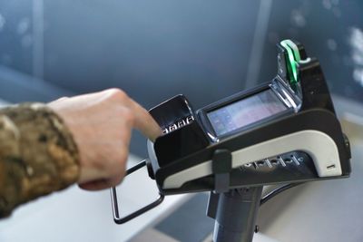 Close-up of man using mobile phone