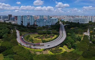 High angle view of road amidst buildings in city