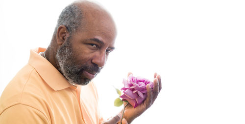 Portrait of man against white background