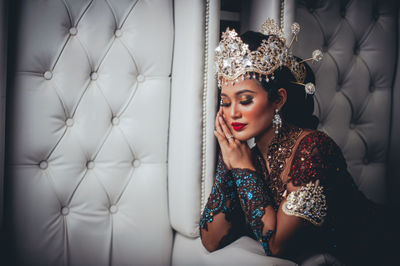 Portrait of young woman looking away