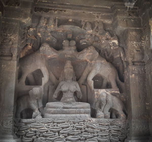 Buddha statue in temple outside building