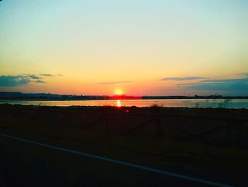 Scenic view of sea at sunset