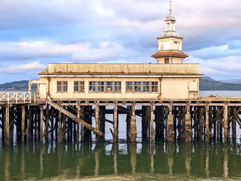 Pier over sea against sky