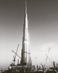 View of crane against sky