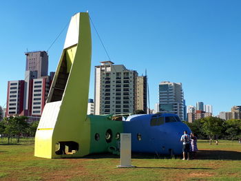 View of skyscrapers against blue sky