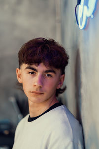 Side portrait of trendy teenager boy