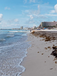 Scenic view of beach against sky