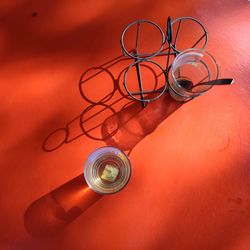 High angle view of glass bottle on table