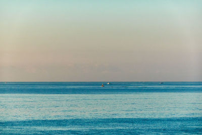 Scenic view of sea against skyduring sunrise