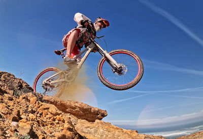 Low angle view of bicycle against sky