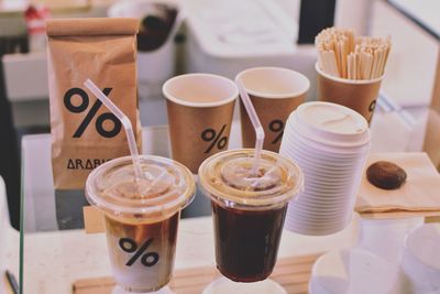 High angle view of disposable cups on table