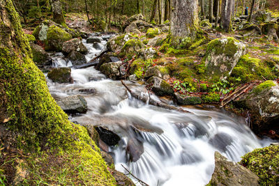 Mountain stream scouet below the great waterfall of tendon