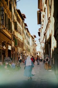 People walking on street in city