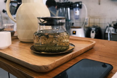 Close-up of drink in glass on table at restaurant